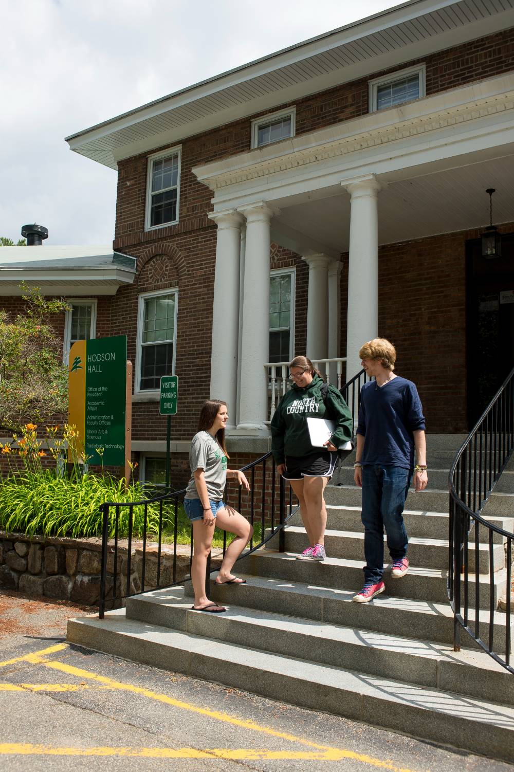Hodson Hall is home to the college's business office on the Saranac Lake campus. Students stand outside Hodson Hall on the Saranac Lake campus.