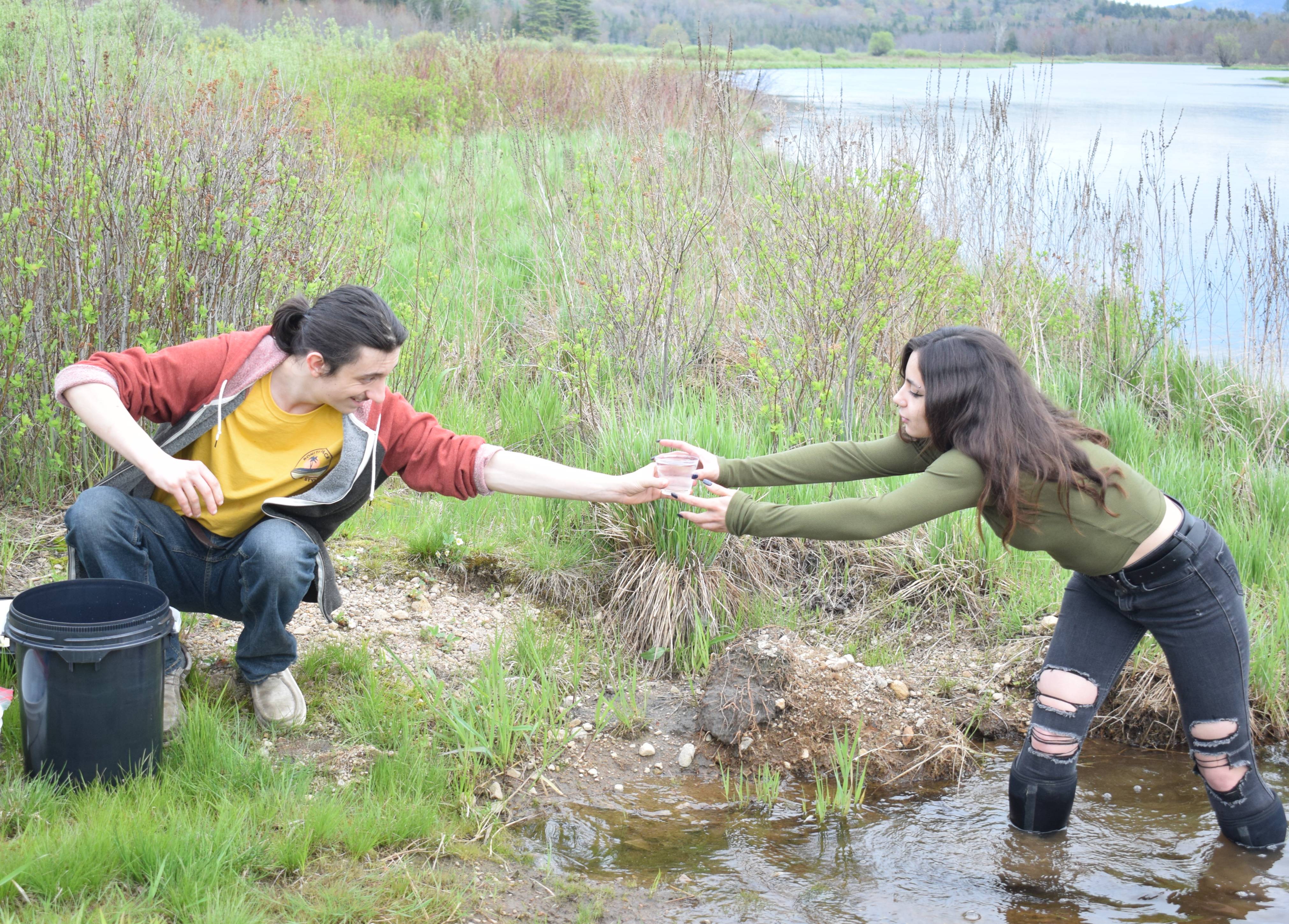 Environmental Science students work in the field along the Saranac River