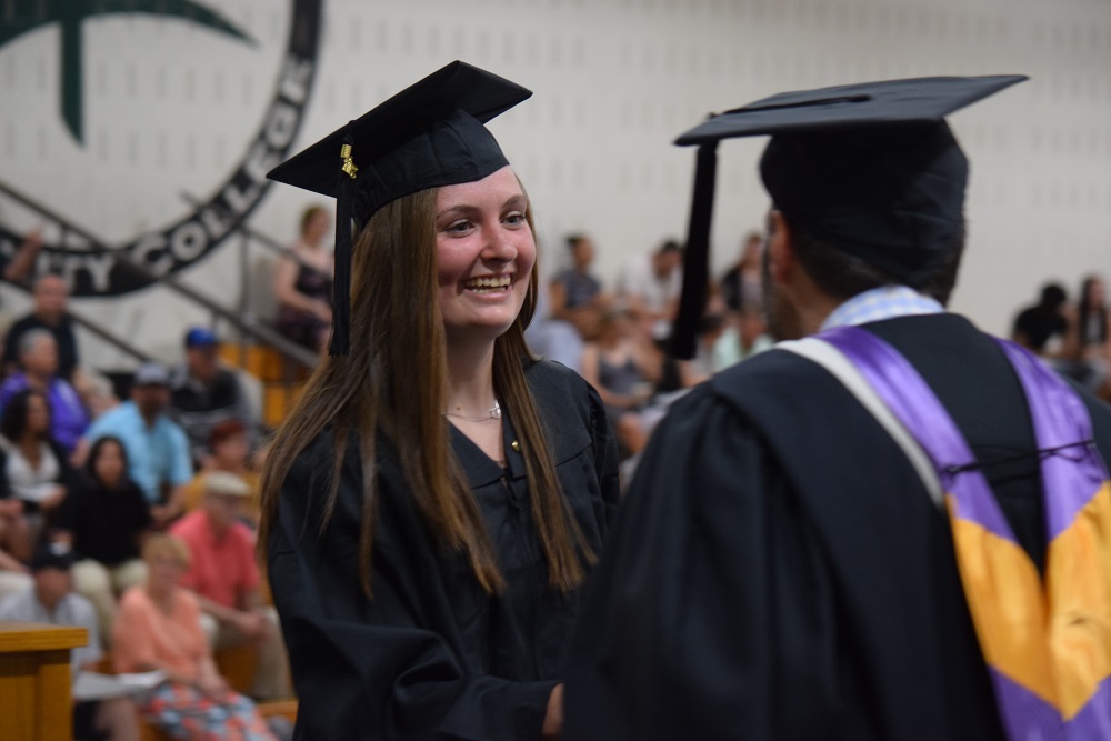 North Country Community College Radiologic Technology student Brynne Gilmore of Ellenburg Center is greeted by college President Joe Keegan after she receives her diploma on Saturday, May 14, 2022.