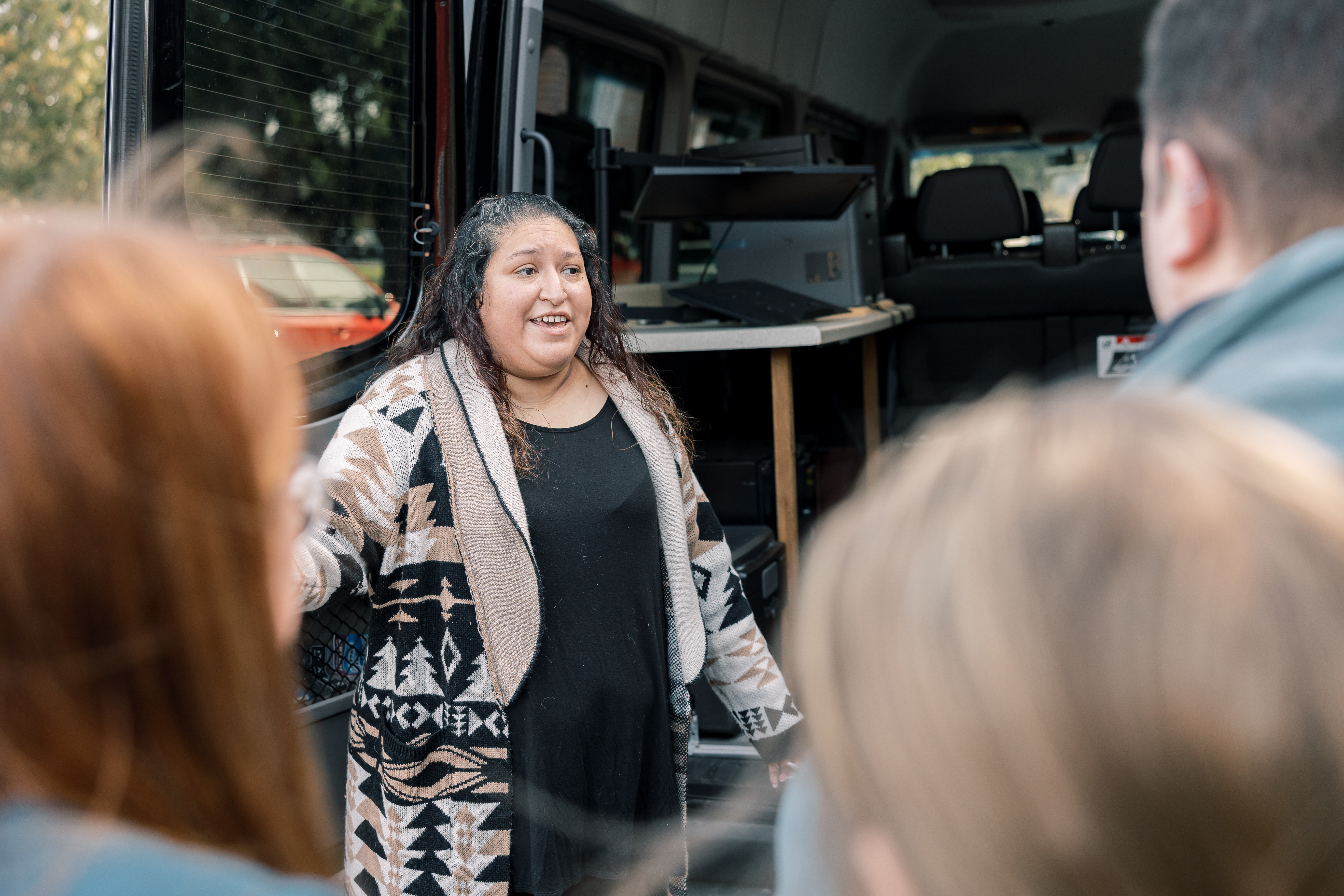 An instructor leads a class of students during a Human Services class