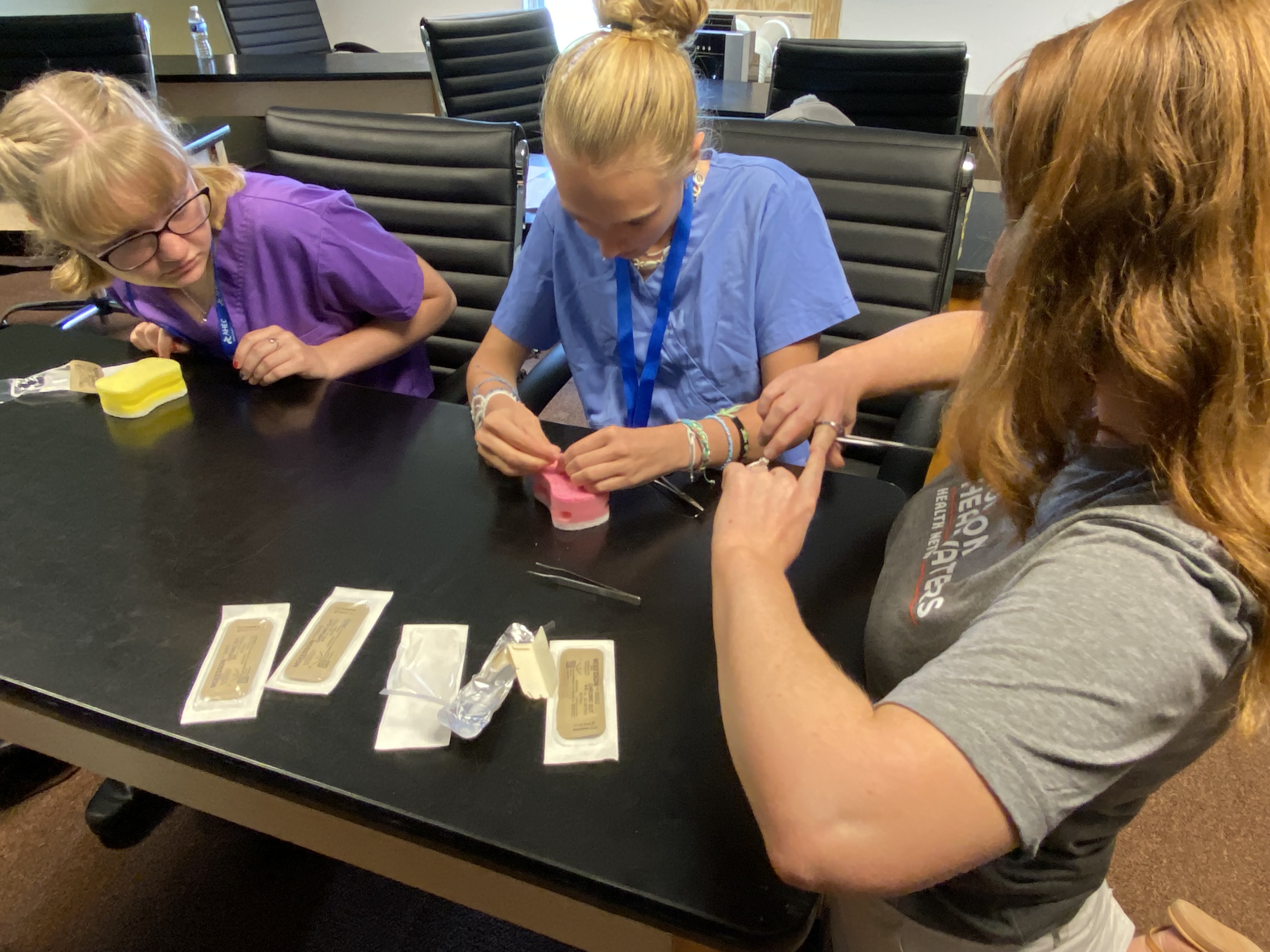 Students work at a table 