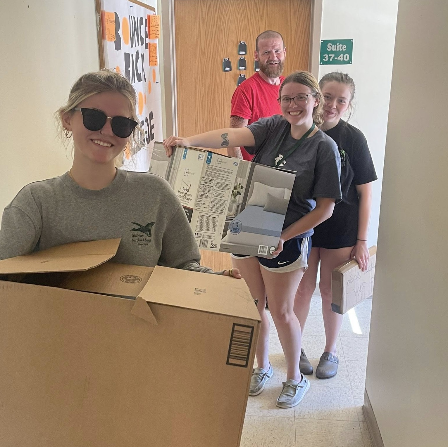 Students move in to a college dorm