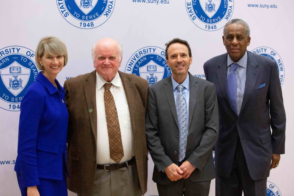 From left, SUNY Chancellor Kristina Johnson, NCCC Board of Trustees Chairman Steve Reed, new NCCC President Joe Keegan, and SUNY Board Chairman H. Carl McCall