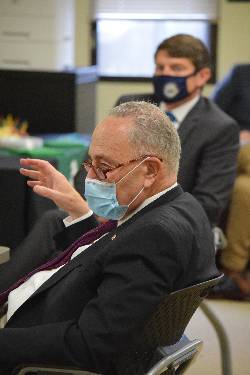 U.S. Sen. Chuck Schumer talks about a grant awarded to NCCC, as Assemblyman Billy Jones listens.